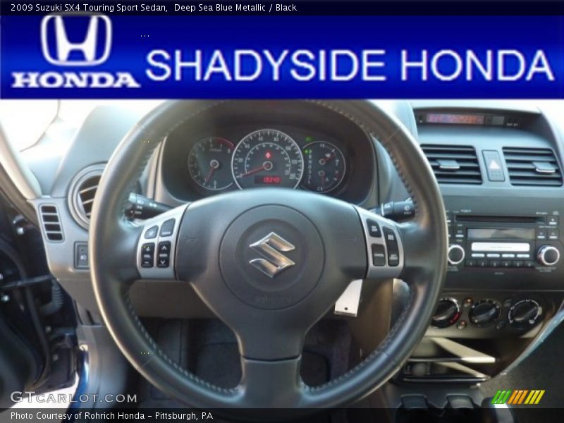 Deep Sea Blue Metallic / Black 2009 Suzuki SX4 Touring Sport Sedan