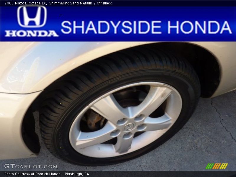 Shimmering Sand Metallic / Off Black 2003 Mazda Protege LX