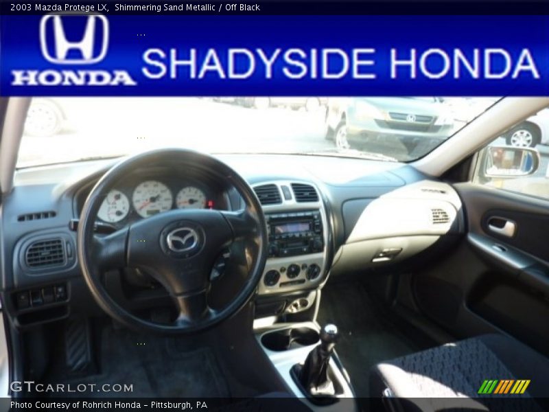 Shimmering Sand Metallic / Off Black 2003 Mazda Protege LX