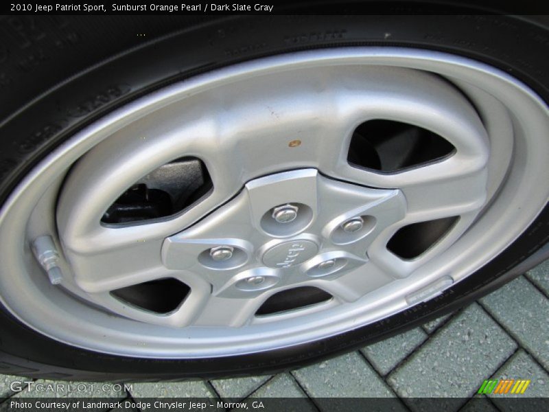 Sunburst Orange Pearl / Dark Slate Gray 2010 Jeep Patriot Sport