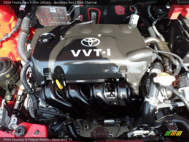 Absolutely Red / Dark Charcoal 2009 Toyota Yaris 3 Door Liftback