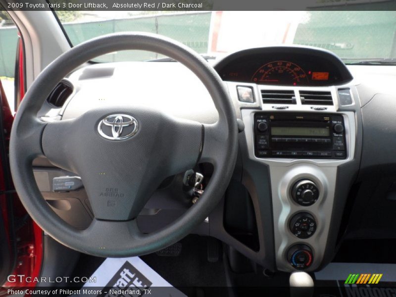 Absolutely Red / Dark Charcoal 2009 Toyota Yaris 3 Door Liftback