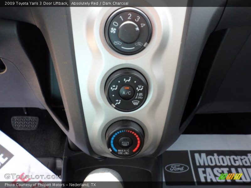 Absolutely Red / Dark Charcoal 2009 Toyota Yaris 3 Door Liftback