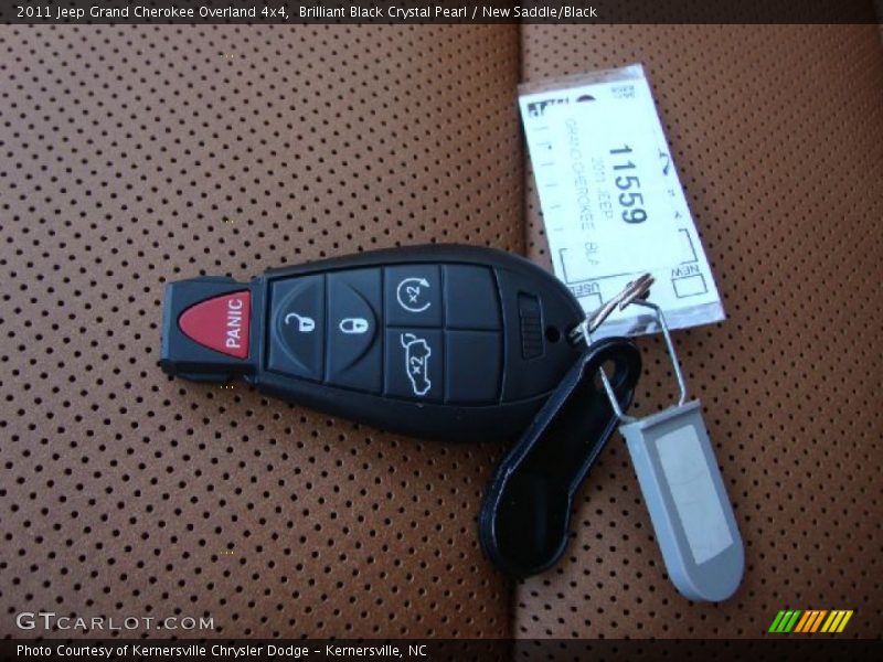 Brilliant Black Crystal Pearl / New Saddle/Black 2011 Jeep Grand Cherokee Overland 4x4