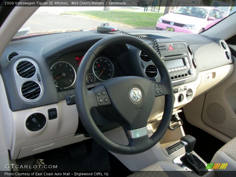 Wild Cherry Metallic / Sandstone 2009 Volkswagen Tiguan SE 4Motion