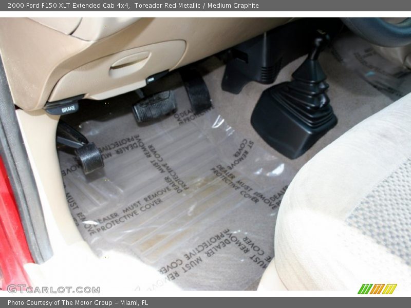 Toreador Red Metallic / Medium Graphite 2000 Ford F150 XLT Extended Cab 4x4