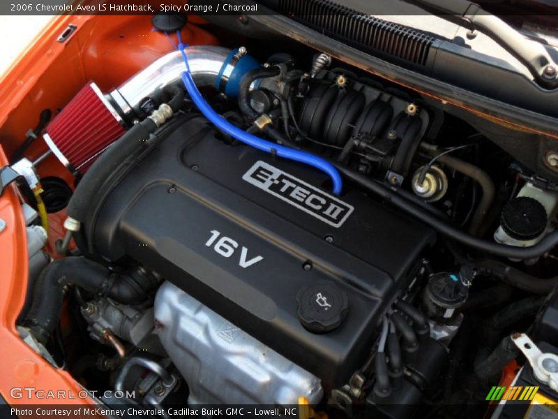 Spicy Orange / Charcoal 2006 Chevrolet Aveo LS Hatchback