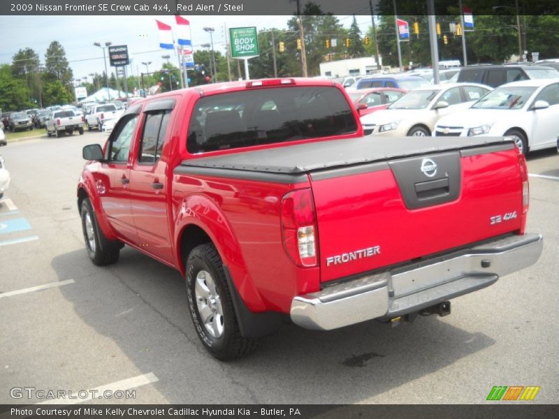 Red Alert / Steel 2009 Nissan Frontier SE Crew Cab 4x4