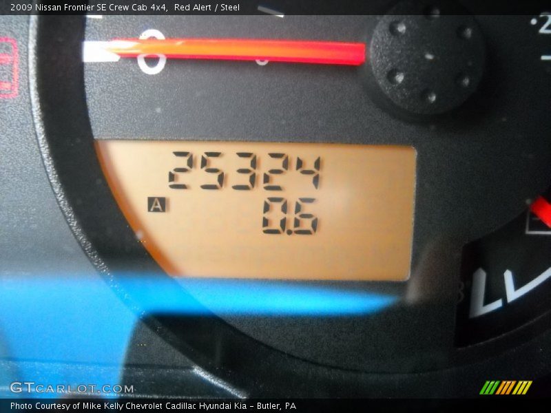 Red Alert / Steel 2009 Nissan Frontier SE Crew Cab 4x4