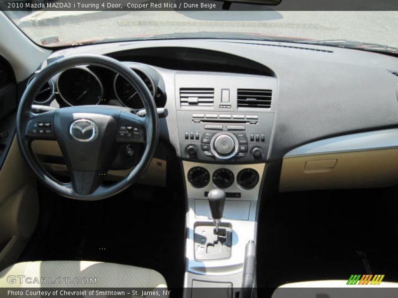 Copper Red Mica / Dune Beige 2010 Mazda MAZDA3 i Touring 4 Door