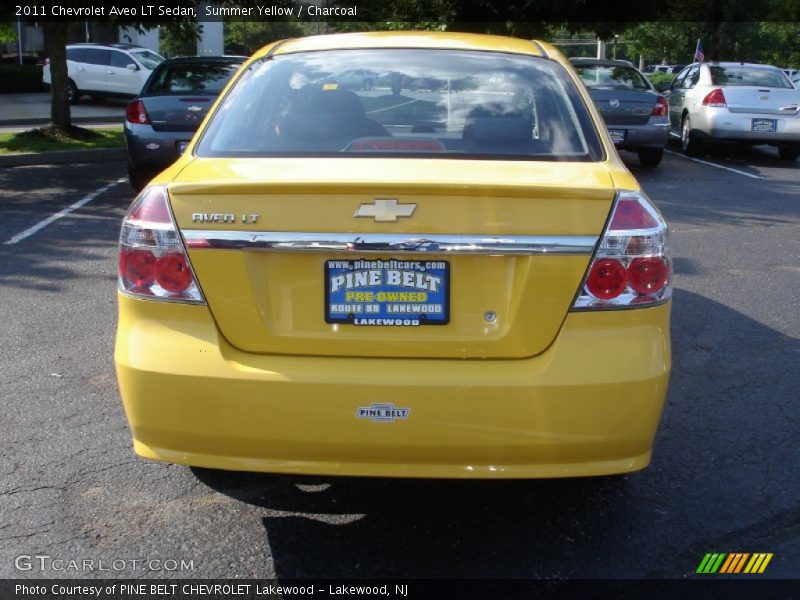 Summer Yellow / Charcoal 2011 Chevrolet Aveo LT Sedan