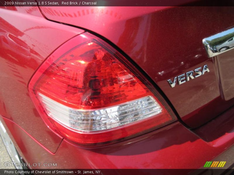 Red Brick / Charcoal 2009 Nissan Versa 1.8 S Sedan