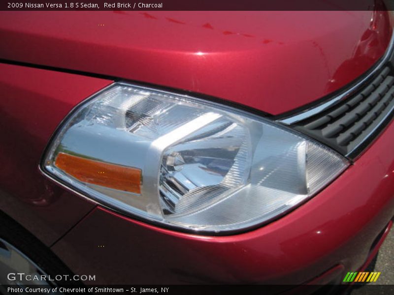 Red Brick / Charcoal 2009 Nissan Versa 1.8 S Sedan
