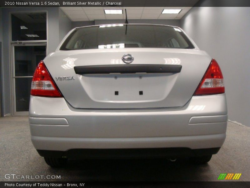 Brilliant Silver Metallic / Charcoal 2010 Nissan Versa 1.6 Sedan
