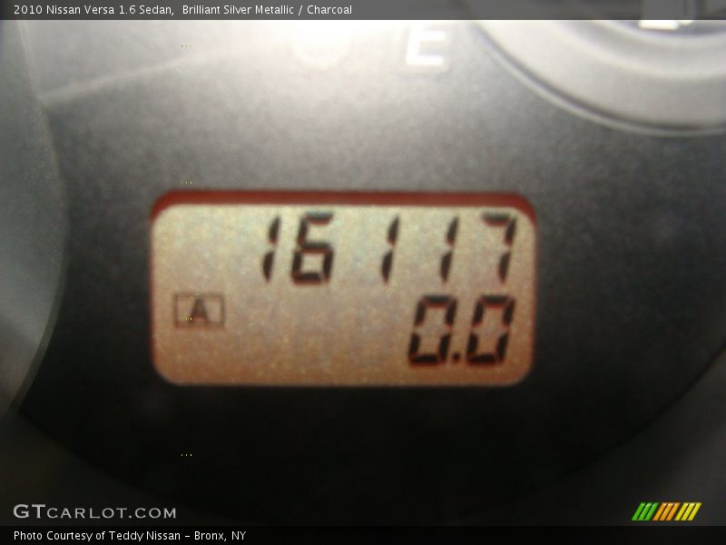 Brilliant Silver Metallic / Charcoal 2010 Nissan Versa 1.6 Sedan