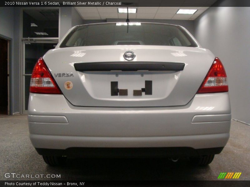 Brilliant Silver Metallic / Charcoal 2010 Nissan Versa 1.6 Sedan