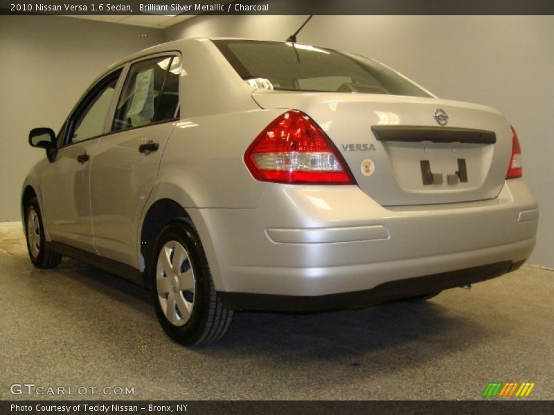 Brilliant Silver Metallic / Charcoal 2010 Nissan Versa 1.6 Sedan