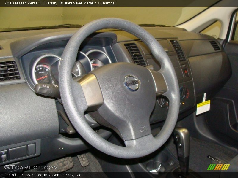 Brilliant Silver Metallic / Charcoal 2010 Nissan Versa 1.6 Sedan