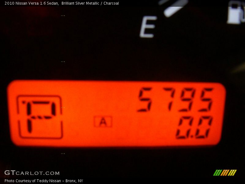 Brilliant Silver Metallic / Charcoal 2010 Nissan Versa 1.6 Sedan
