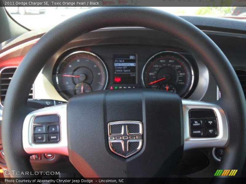 Toxic Orange Pearl / Black 2011 Dodge Charger SE