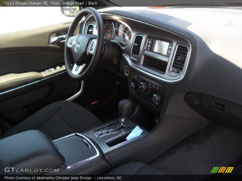 Toxic Orange Pearl / Black 2011 Dodge Charger SE