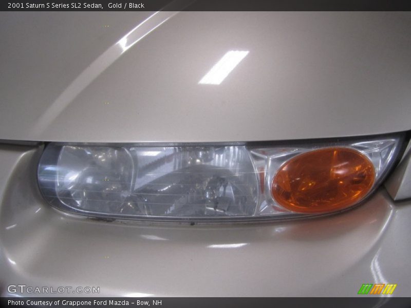Gold / Black 2001 Saturn S Series SL2 Sedan