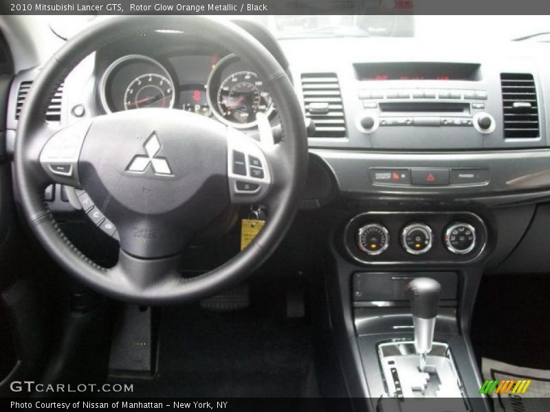 Rotor Glow Orange Metallic / Black 2010 Mitsubishi Lancer GTS