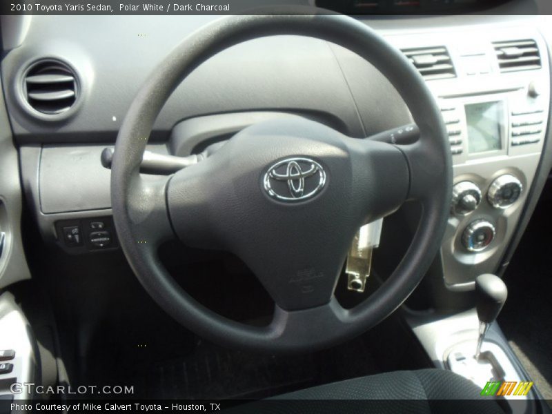 Polar White / Dark Charcoal 2010 Toyota Yaris Sedan