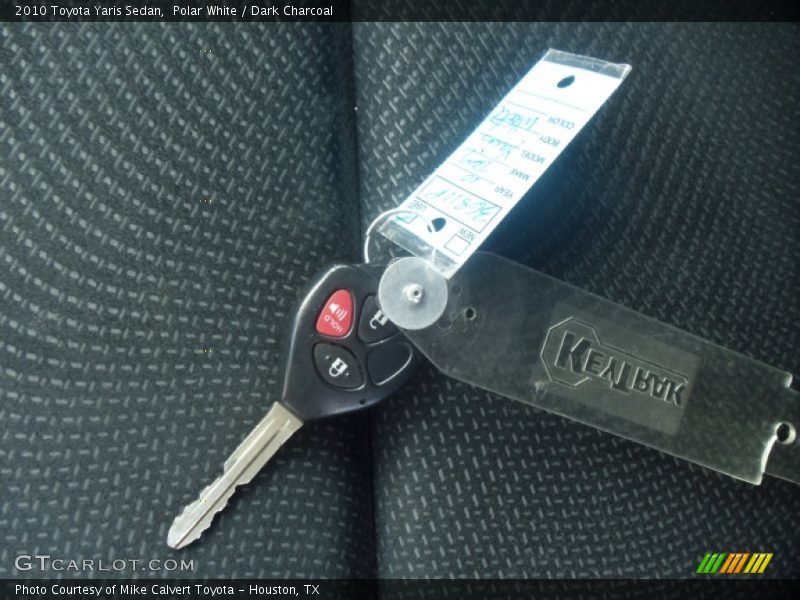 Polar White / Dark Charcoal 2010 Toyota Yaris Sedan