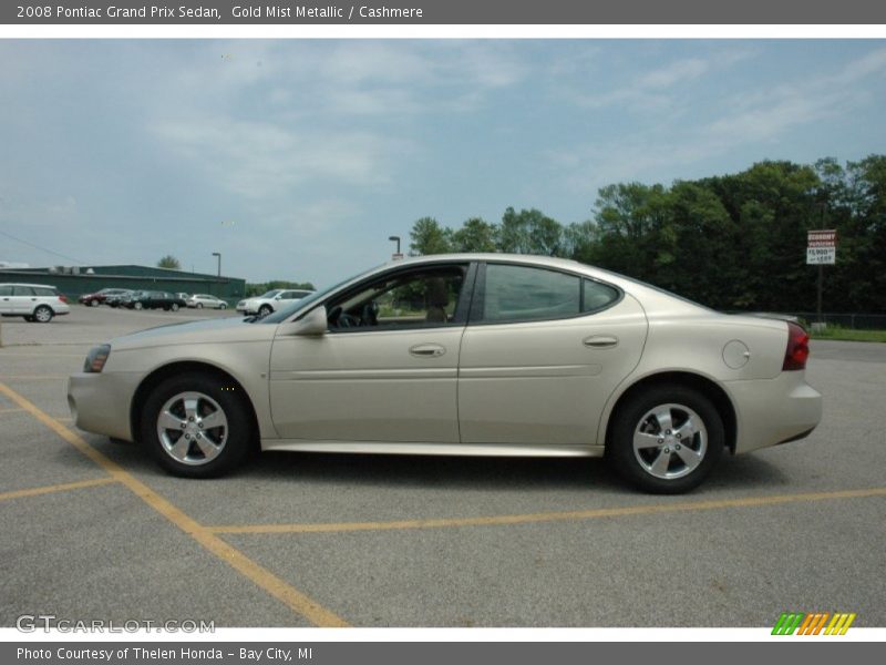  2008 Grand Prix Sedan Gold Mist Metallic