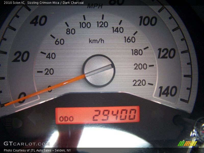 Sizzling Crimson Mica / Dark Charcoal 2010 Scion tC
