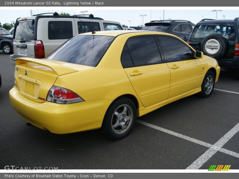Lightning Yellow / Black 2004 Mitsubishi Lancer OZ Rally