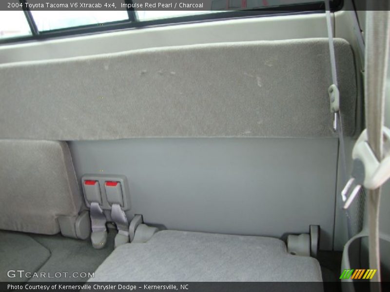 Impulse Red Pearl / Charcoal 2004 Toyota Tacoma V6 Xtracab 4x4
