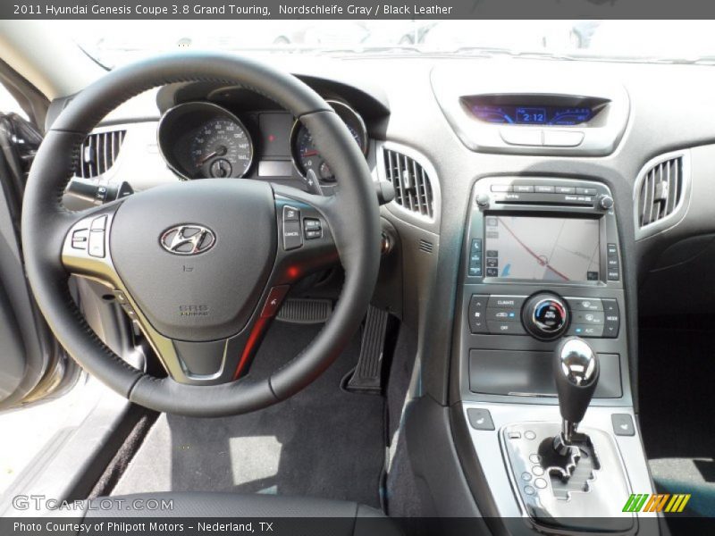 Dashboard of 2011 Genesis Coupe 3.8 Grand Touring