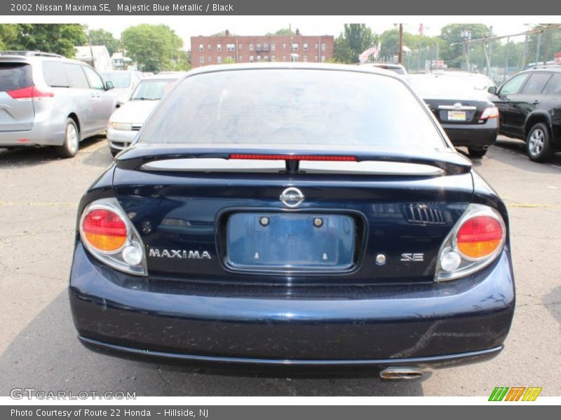 Majestic Blue Metallic / Black 2002 Nissan Maxima SE