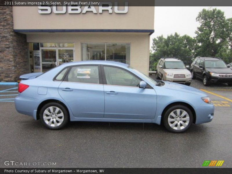 Sky Blue Pearl / Ivory 2011 Subaru Impreza 2.5i Sedan