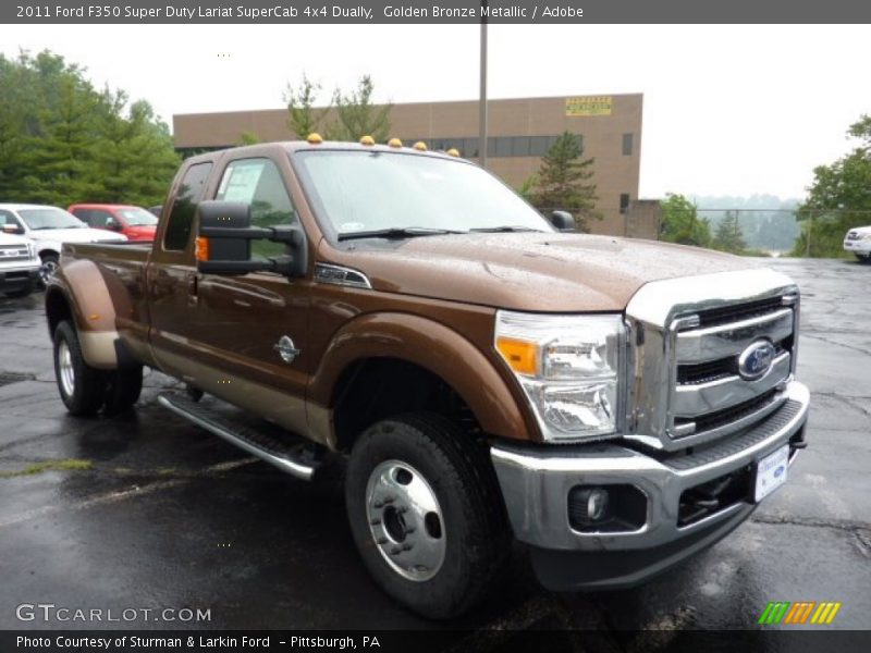 Front 3/4 View of 2011 F350 Super Duty Lariat SuperCab 4x4 Dually