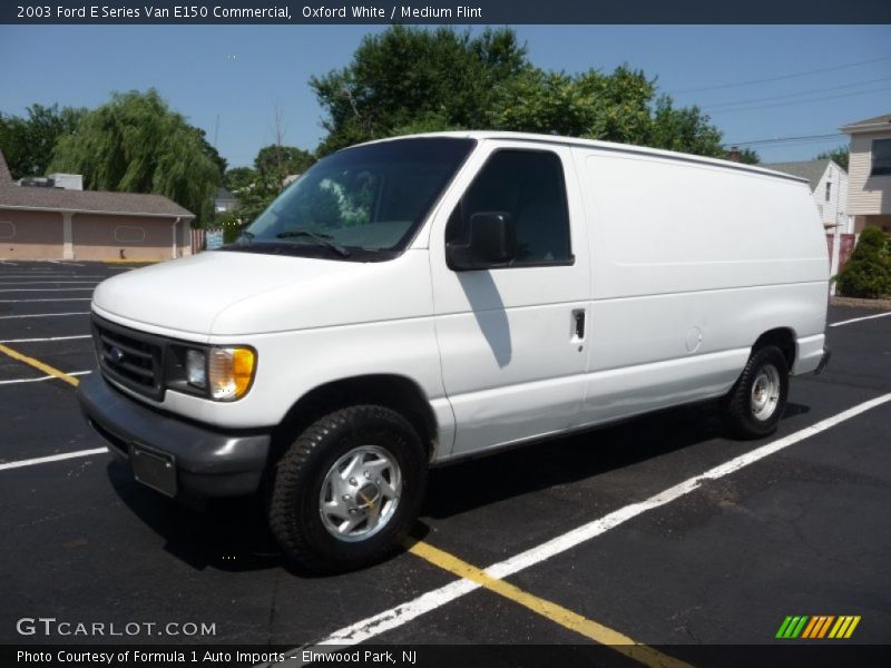Front 3/4 View of 2003 E Series Van E150 Commercial