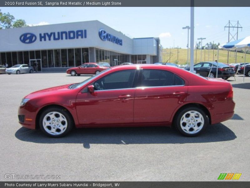 Sangria Red Metallic / Medium Light Stone 2010 Ford Fusion SE