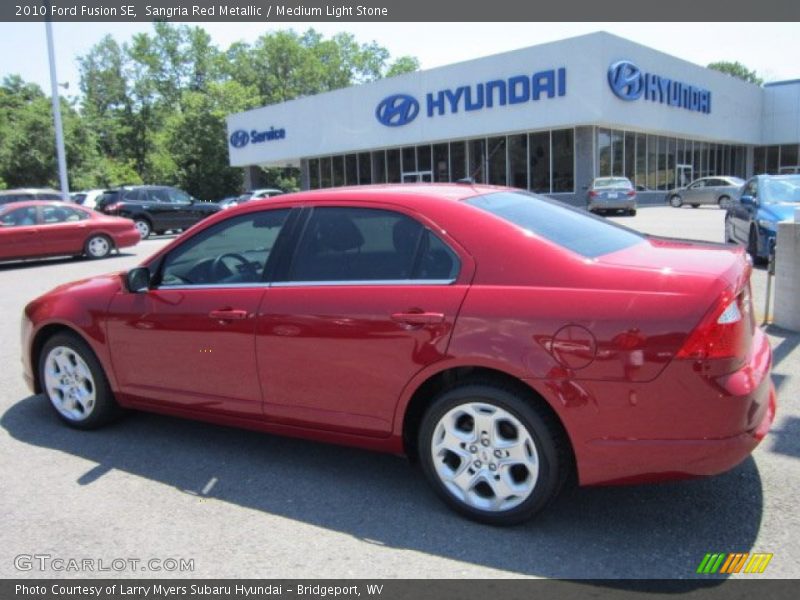 Sangria Red Metallic / Medium Light Stone 2010 Ford Fusion SE
