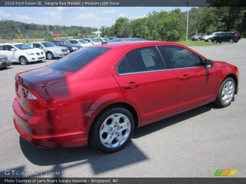 Sangria Red Metallic / Medium Light Stone 2010 Ford Fusion SE