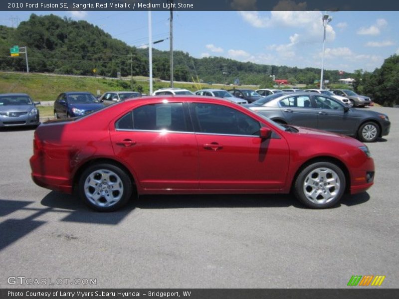 Sangria Red Metallic / Medium Light Stone 2010 Ford Fusion SE