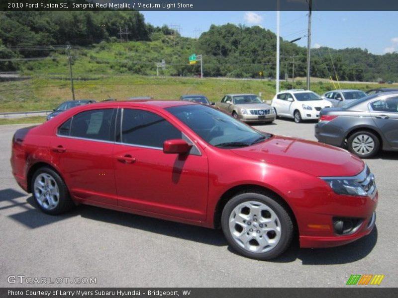 Sangria Red Metallic / Medium Light Stone 2010 Ford Fusion SE