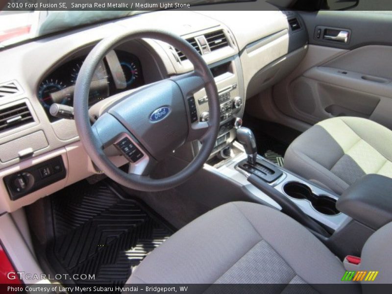 Sangria Red Metallic / Medium Light Stone 2010 Ford Fusion SE