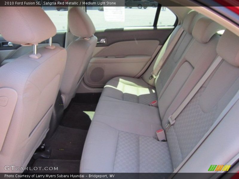 Sangria Red Metallic / Medium Light Stone 2010 Ford Fusion SE