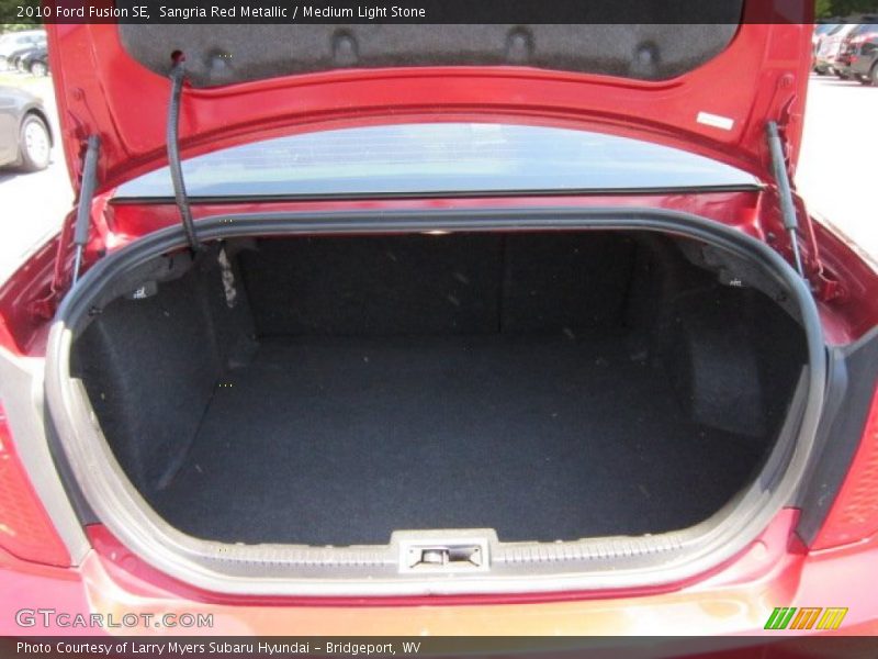 Sangria Red Metallic / Medium Light Stone 2010 Ford Fusion SE