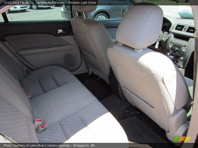 Sangria Red Metallic / Medium Light Stone 2010 Ford Fusion SE