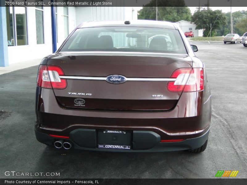 Cinnamon Red Metallic / Light Stone 2010 Ford Taurus SEL