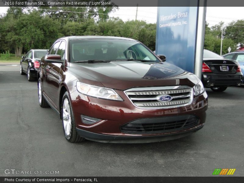 Cinnamon Red Metallic / Light Stone 2010 Ford Taurus SEL