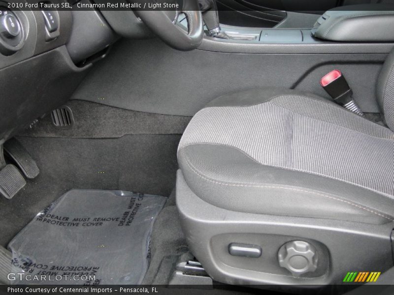 Cinnamon Red Metallic / Light Stone 2010 Ford Taurus SEL